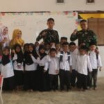 Tinggalkan Sejenak Pekerjaan Fisik, Personel TMMD Pilih Temui Anak-anak TK, Ada Apa? ff7e5ab8 044c 472b bee9 cc5bcb0006ea